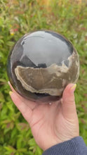 Load and play video in Gallery viewer, Large Uv reactive Volcano Agate Sphere 12cm
