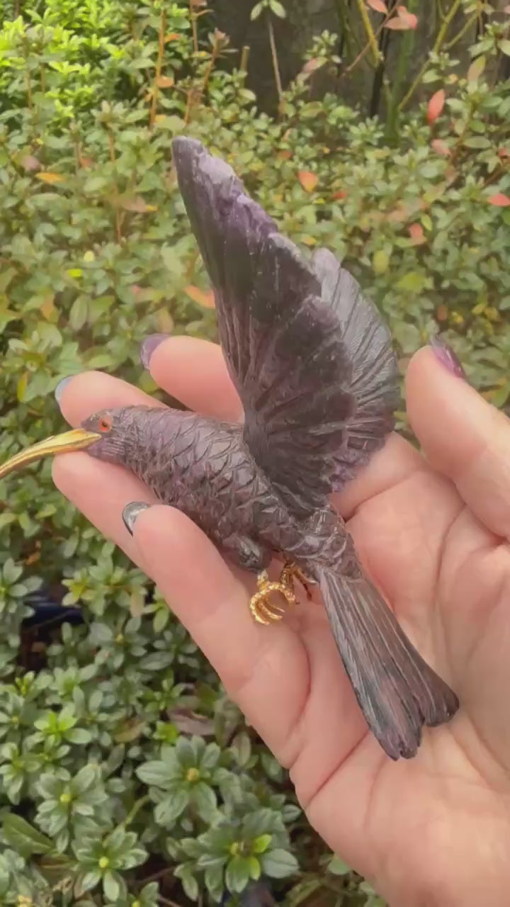Handcarved Sugilite Humming Bird on a Quartz and Pyrite Base with a Mangano Calcite Flower and Serpentine Petals