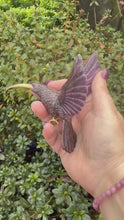 Load and play video in Gallery viewer, Handcarved Sugilite Humming Bird on a Quartz and Pyrite Base with a Mangano Calcite Flower and Serpentine Petals
