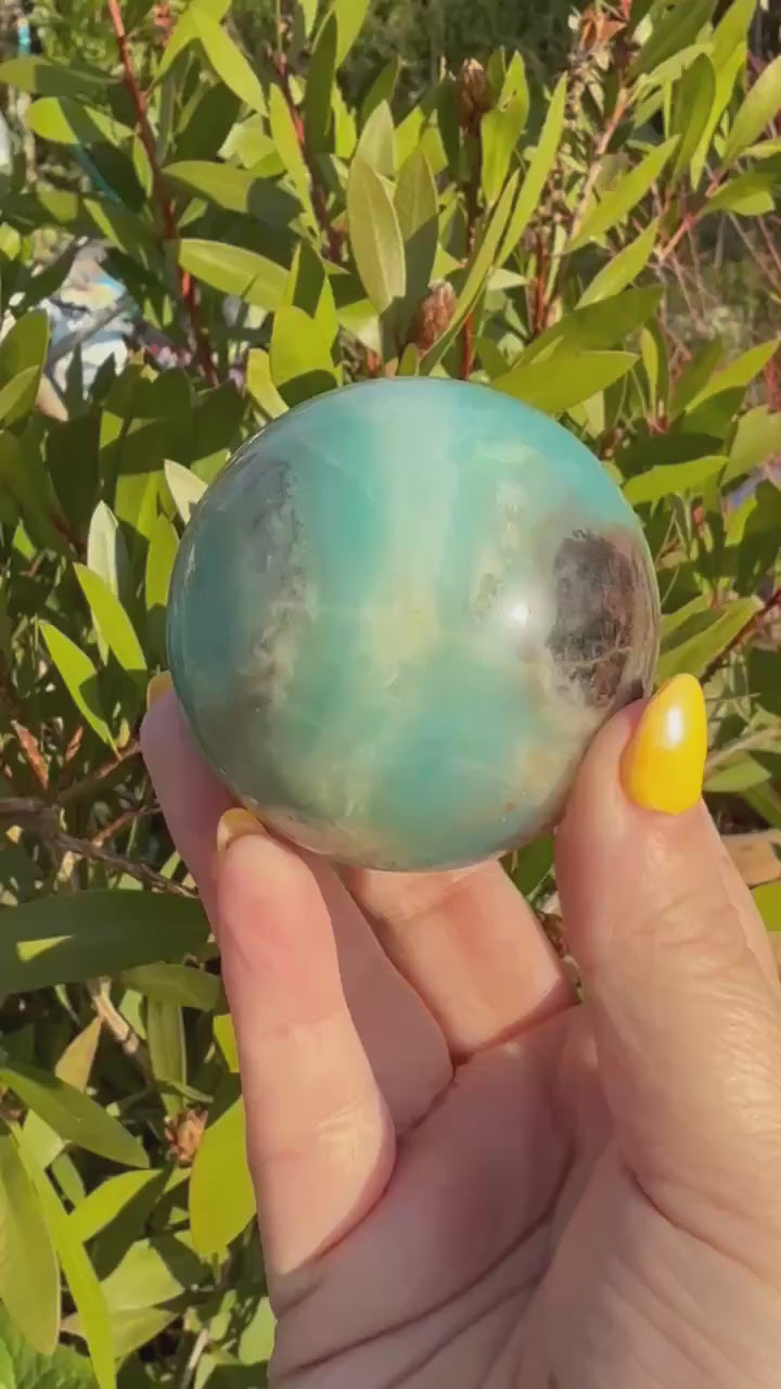 Blue calcite and Tourmaline Sphere