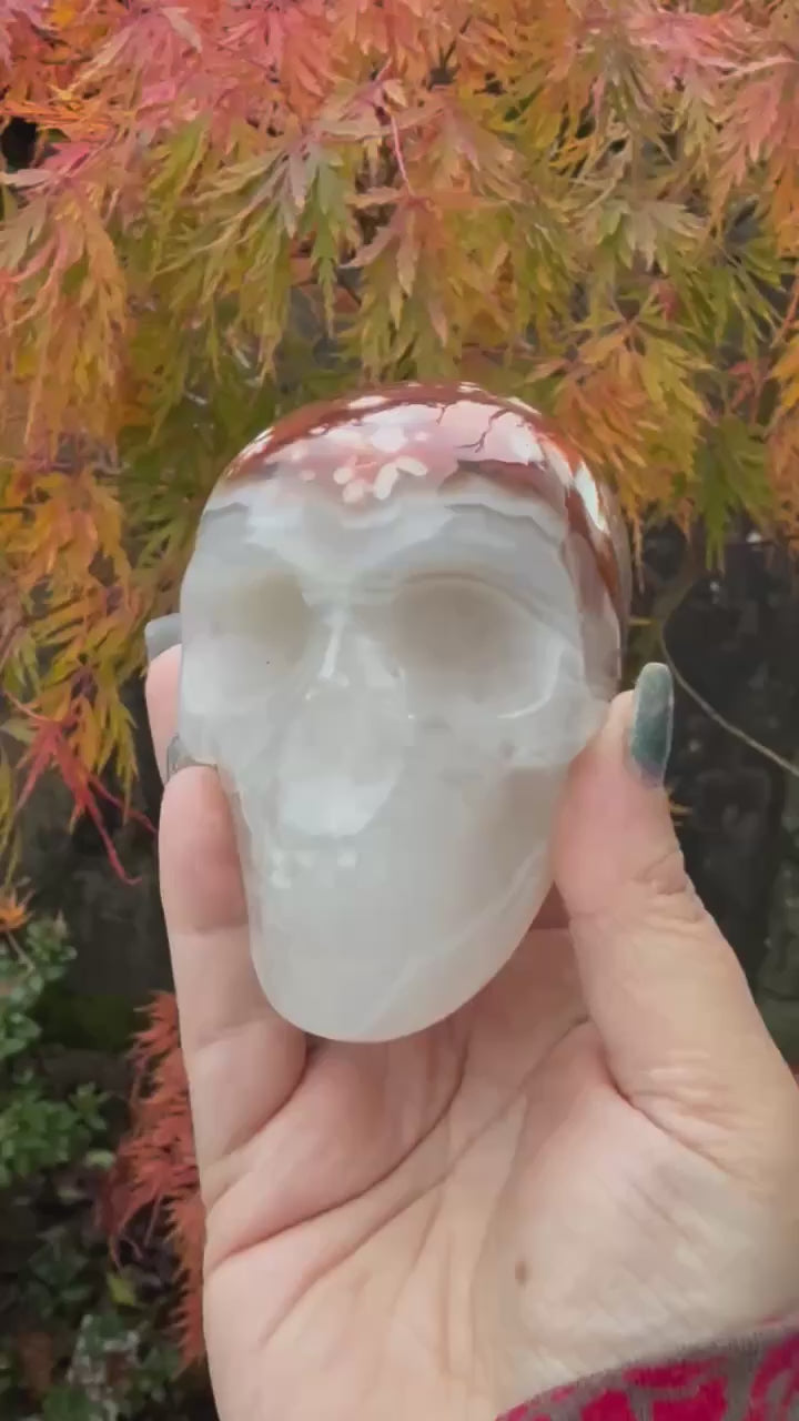 Carnelian Flower Agate and Quartz Skull Carving