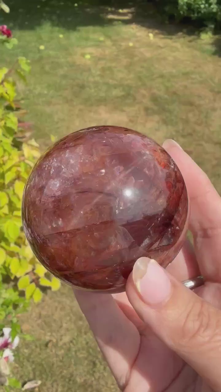Fire Quartz Sphere with Hematite and Star Flash 6.1cm Dia