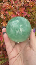 Load and play video in Gallery viewer, Green Fluorite with Feathers Sphere 6.5cm Diameter
