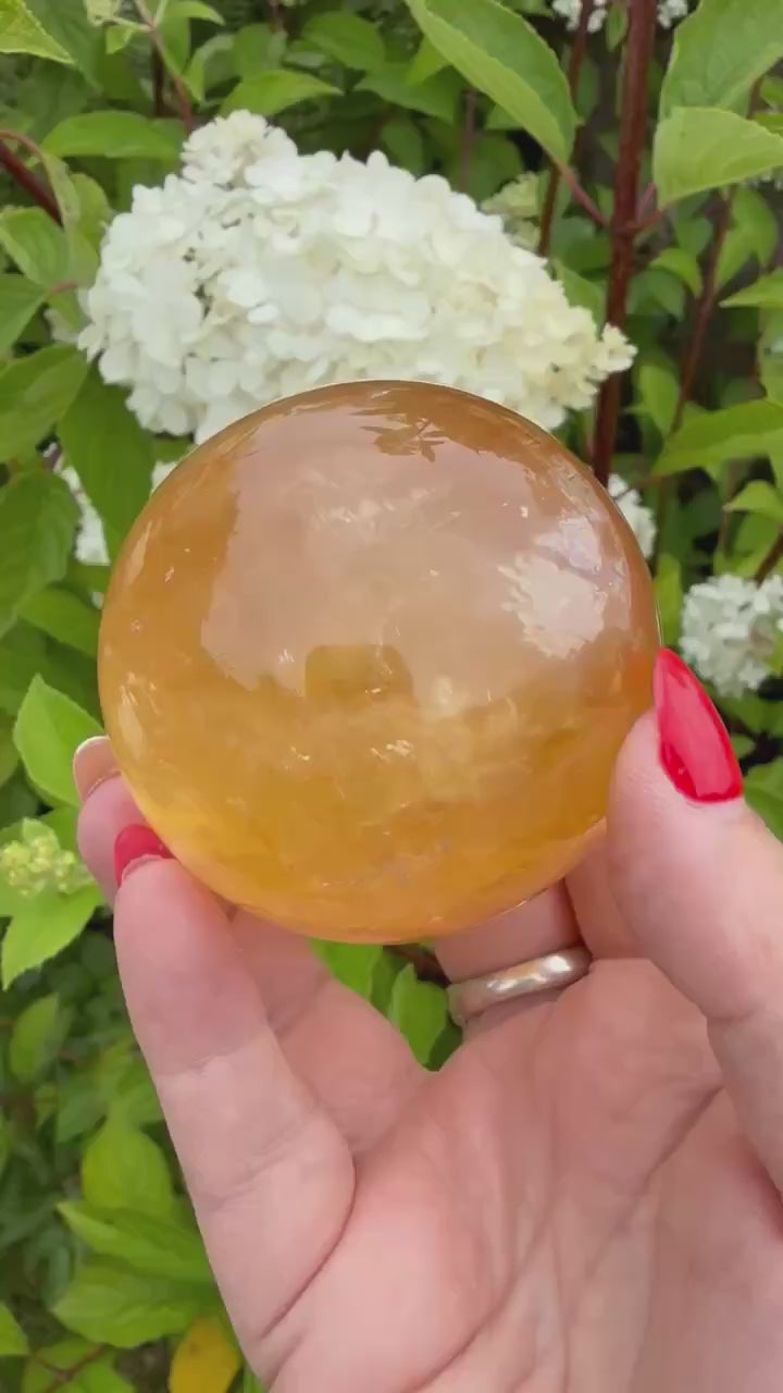 Honey Calcite Sphere with rainbows 5.7cm dia