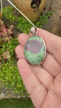 Load and play video in Gallery viewer, Faceted Ruby in Zoisite Silver Pendant
