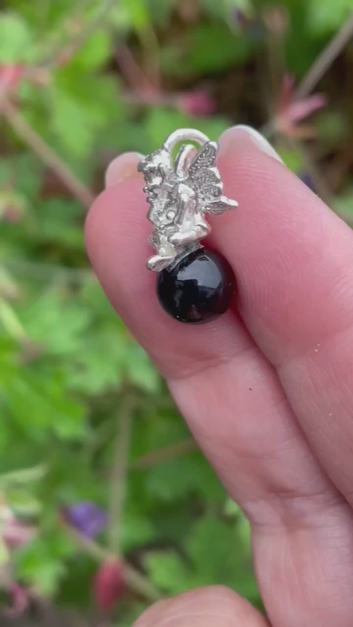 Silver Pixie on a Black Onyx Ball